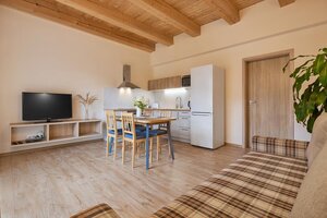 Lukratívny apartmánový dom s rozlohou pozemku 1684 m2 — foto 11